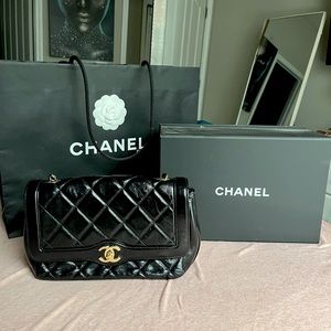 Chanel cross over bag .. excellent condition is almost brand new